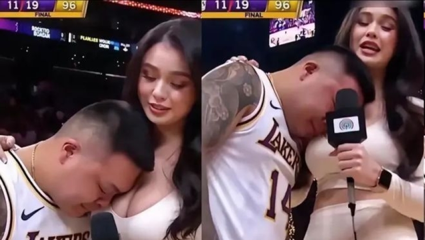 湖人圣诞大战输球后 男球迷倚靠在美女记者怀里痛哭照片意外走红